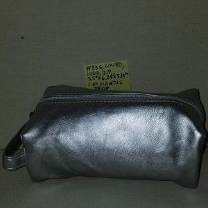 #836 NWOT RARE La Pairie Soft Silver Cosmetic Bag